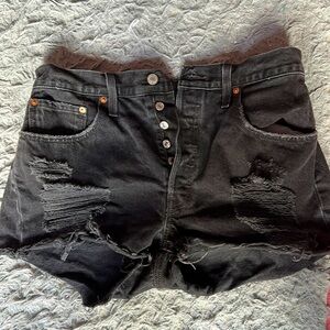 black denim distressed shorts
